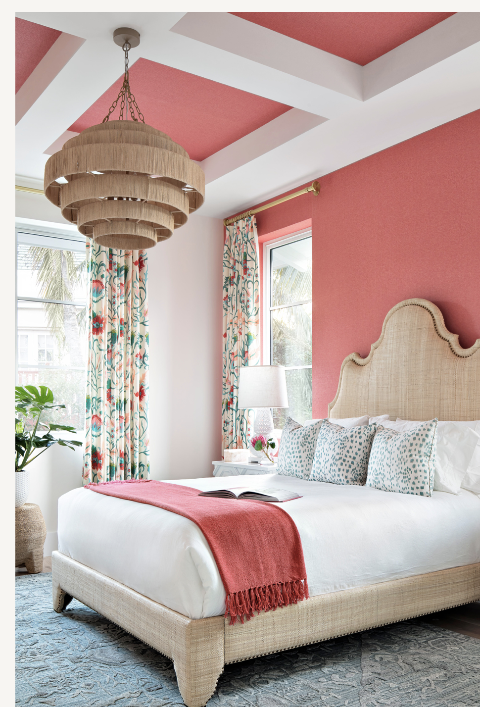 
While many of the rooms incorporate whites, blues, and grays, this bedroom’s deep coral hues bring in the warmth and vibrancy of the tropics.  

